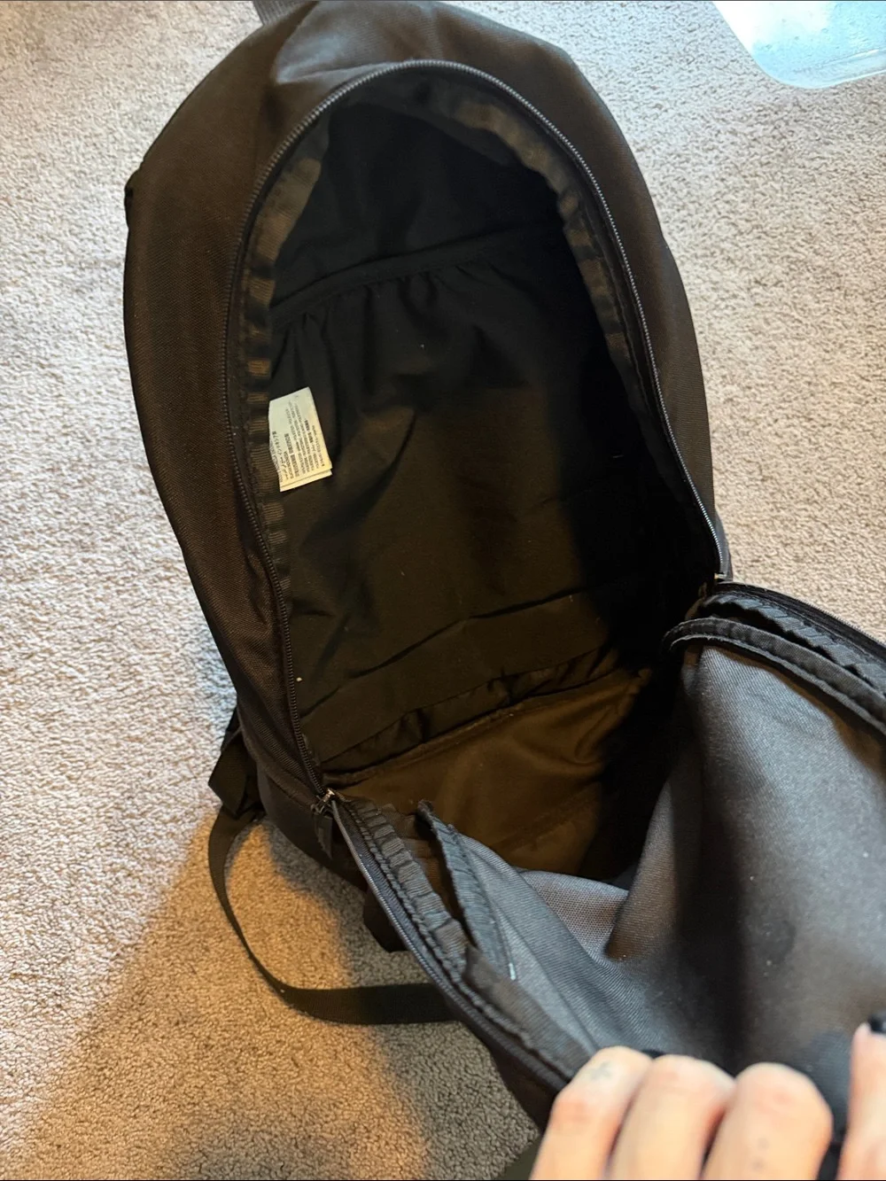 Black Jordan Backpack with Red Jumpman and White Lettering
